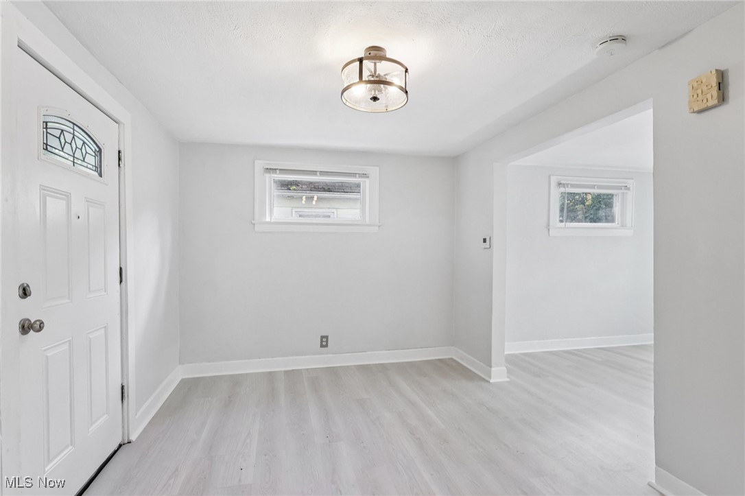 1469 South Noble Road Cleveland, OH 44121 - Photo 11 of 29 Entrance foyer with light wood-type flooring and plenty of natural light