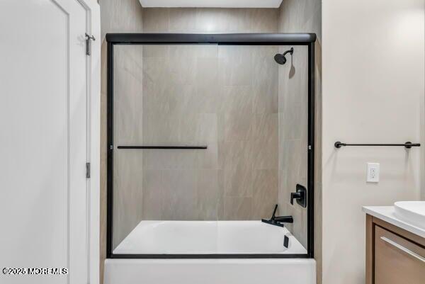 22 Cooper Avenue, Unit 202 Long Branch, NJ 07740 - Photo 24 of 38 a bathroom with a bath tub and shower