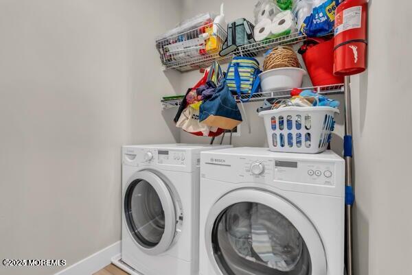 22 Cooper Avenue, Unit 202 Long Branch, NJ 07740 - Photo 26 of 38 a utility room with dryer and washer