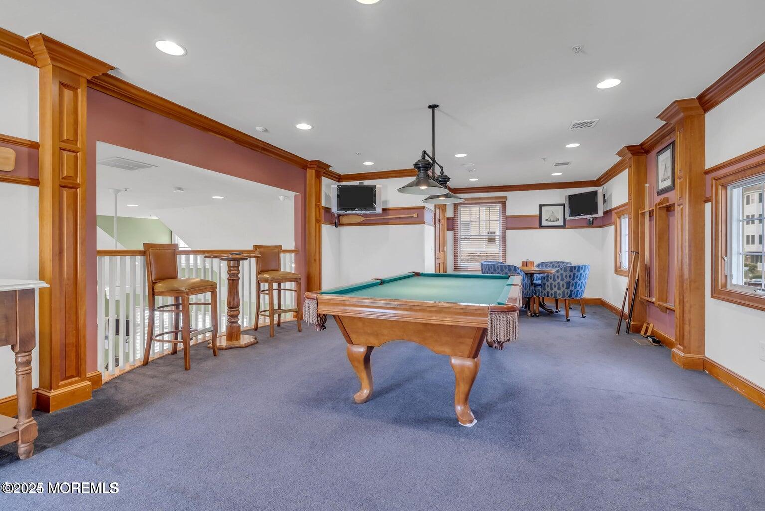 22 Cooper Avenue, Unit 202 Long Branch, NJ 07740 - Photo 28 of 38 a room with pool table and a large window
