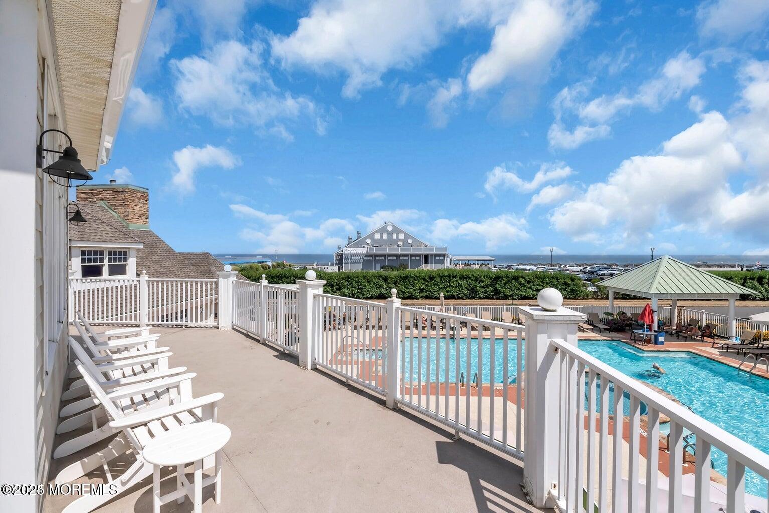 22 Cooper Avenue, Unit 202 Long Branch, NJ 07740 - Photo 34 of 38 a view of city from balcony