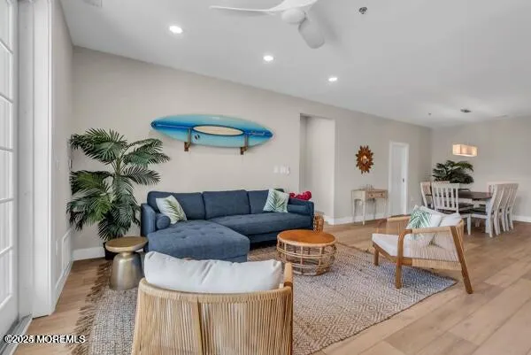 a view of a room that has a dining table and chairs