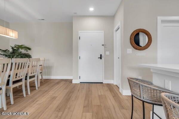 22 Cooper Avenue, Unit 202 Long Branch, NJ 07740 - Photo 6 of 38 a view of a room that has a dining table and chairs