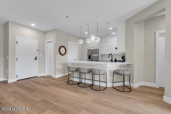 22 Cooper Avenue, Unit 202 Long Branch, NJ 07740 - Photo 7 of 38 a view of living room with furniture and wooden floor