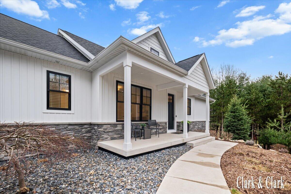 10660 Kissing Ridge Drive Southeast Lowell, MI 49331 - Photo 2 of 51 036-EXTERIOR 11A