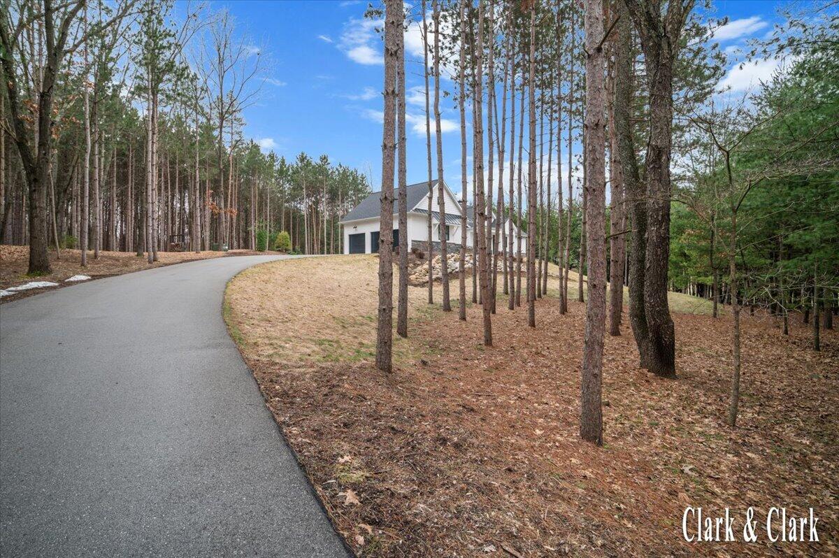 10660 Kissing Ridge Drive Southeast Lowell, MI 49331 - Photo 38 of 51 016-EXTERIOR 01A