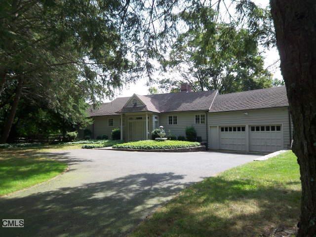 15 Verna Field Road Fairfield, CT 06824 - Photo 1 of 1 a front view of house with yard and green space