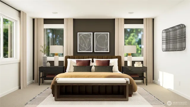 a bedroom with a large bed and a window