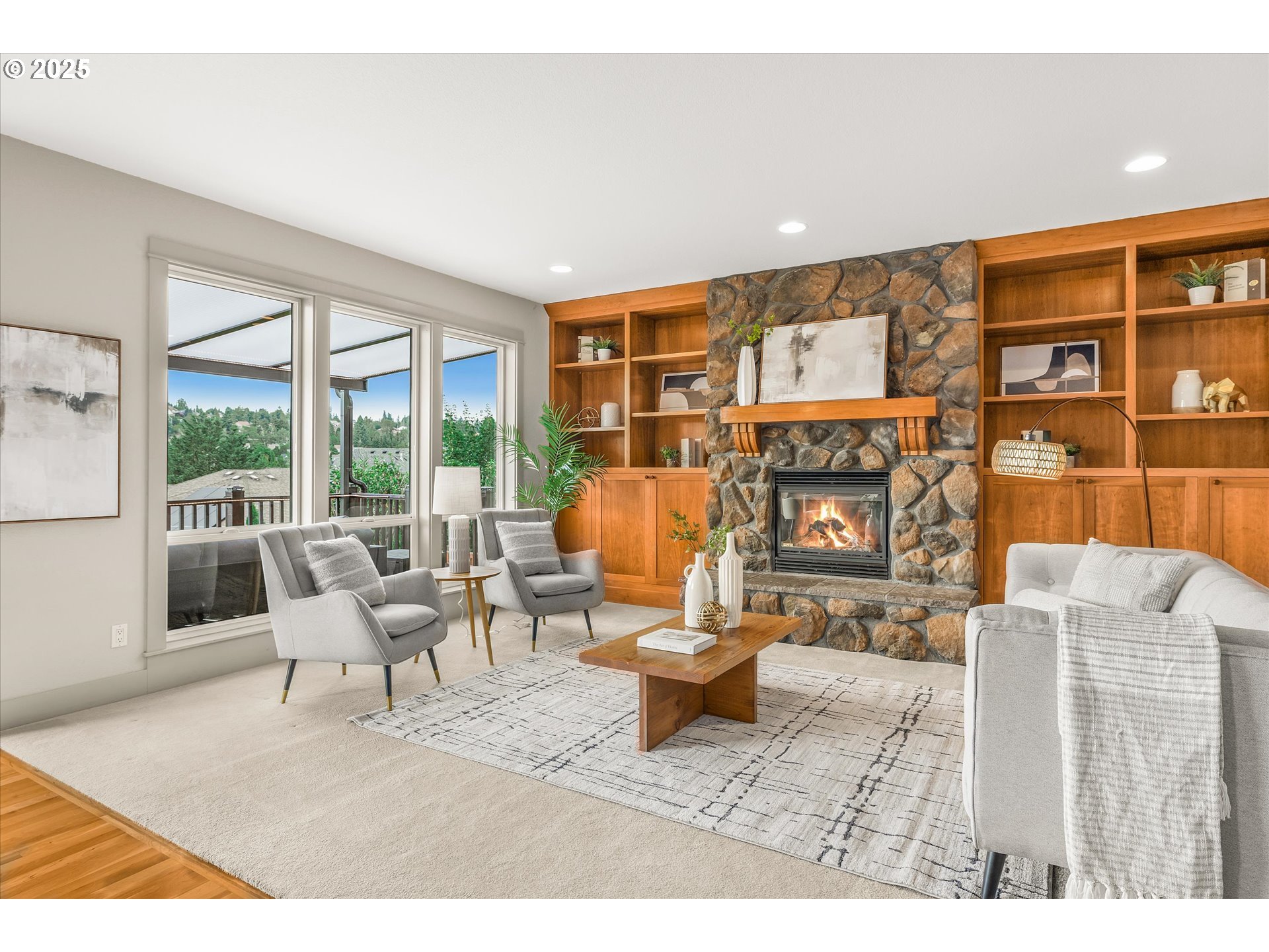 14697 Southeast Poppy Hills Drive Happy Valley, OR 97086 - Photo 12 of 48 a living room with furniture and large window