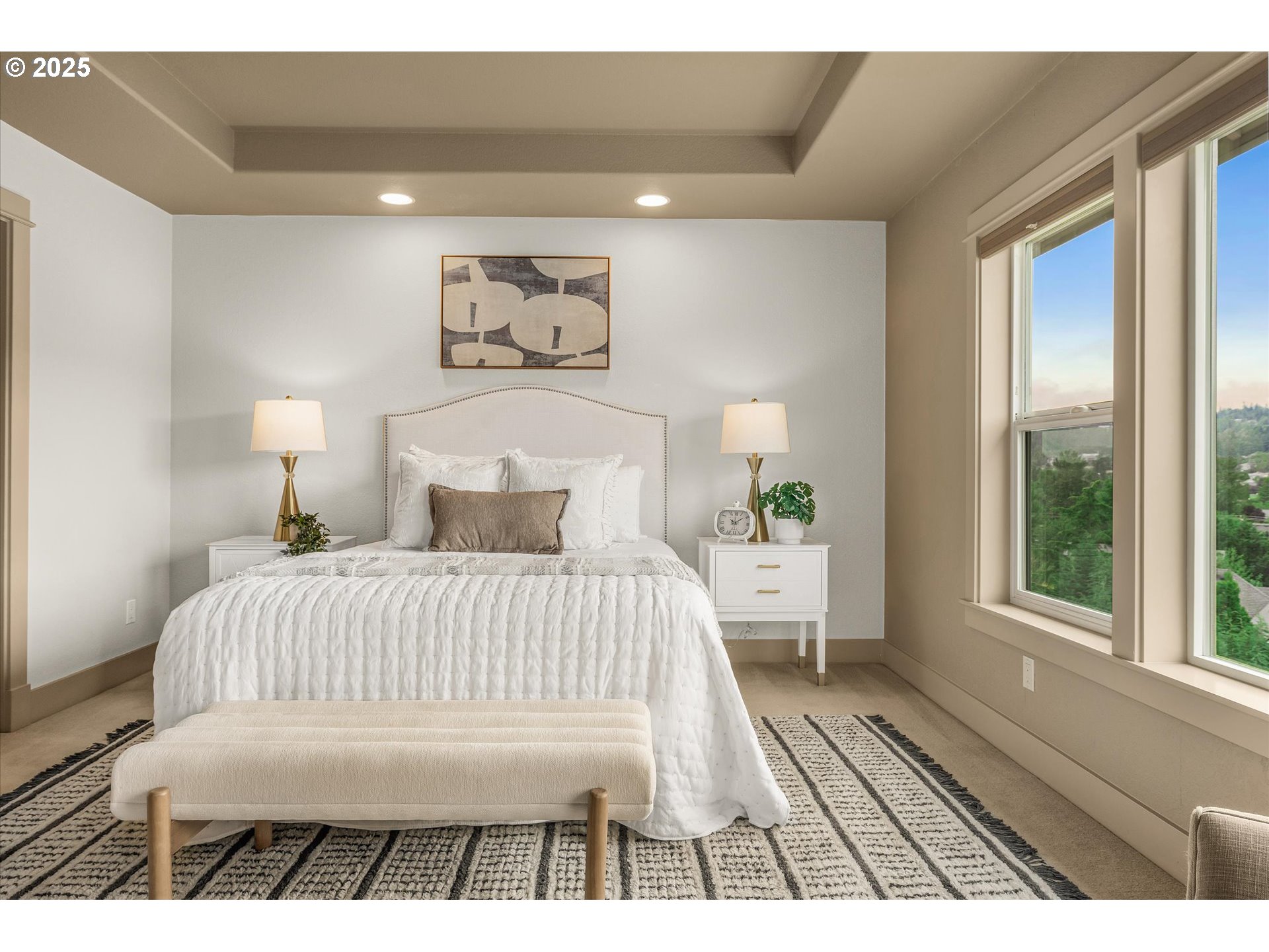 14697 Southeast Poppy Hills Drive Happy Valley, OR 97086 - Photo 22 of 48 a bedroom with a large bed and a large window