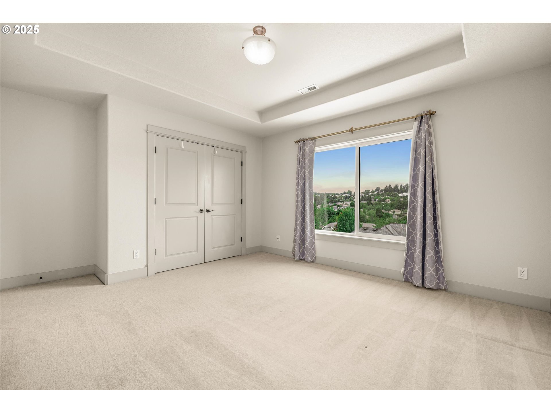 14697 Southeast Poppy Hills Drive Happy Valley, OR 97086 - Photo 28 of 48 a view of an empty room with a window