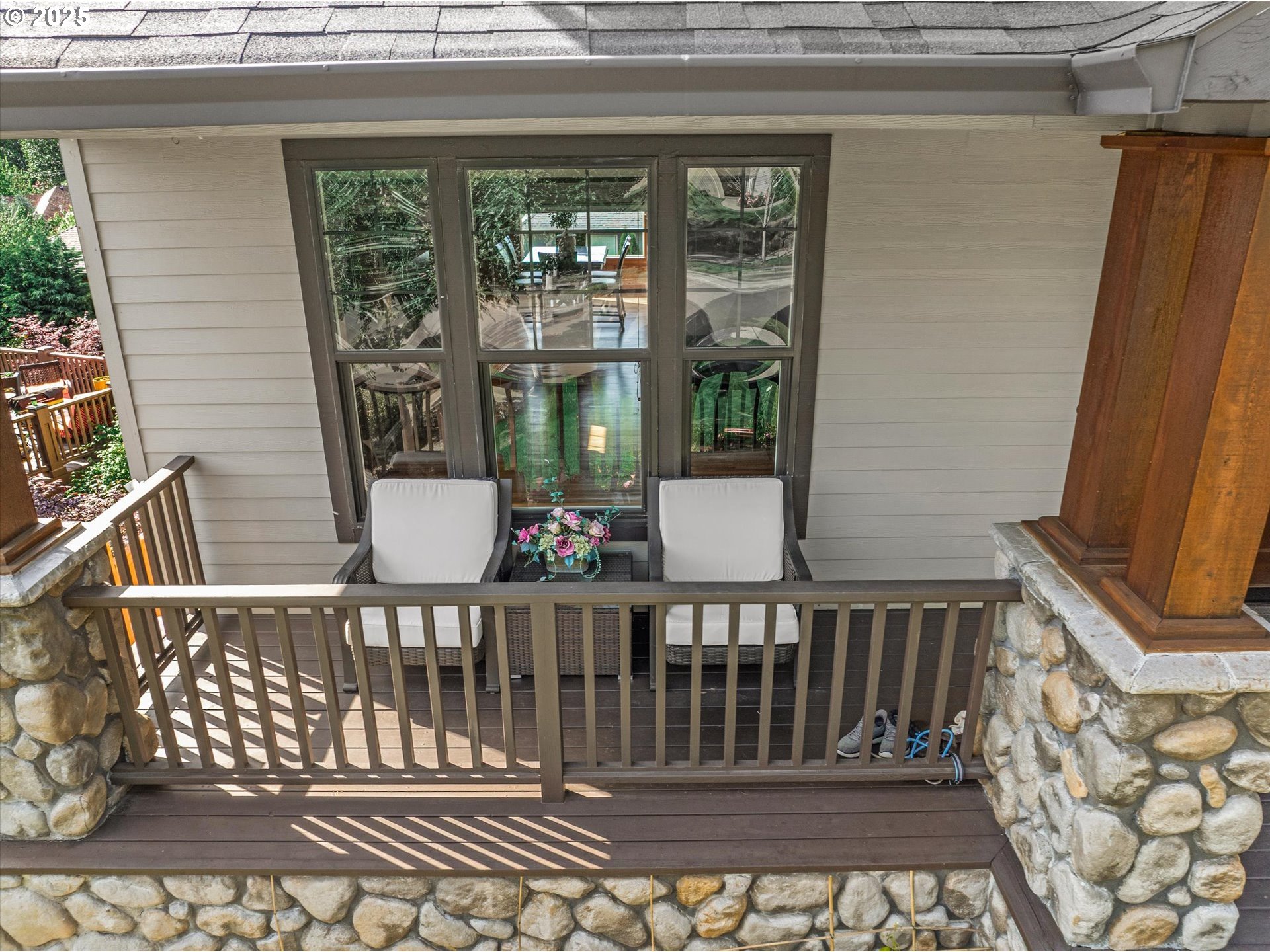 14697 Southeast Poppy Hills Drive Happy Valley, OR 97086 - Photo 44 of 48 a view of a porch with wooden floor