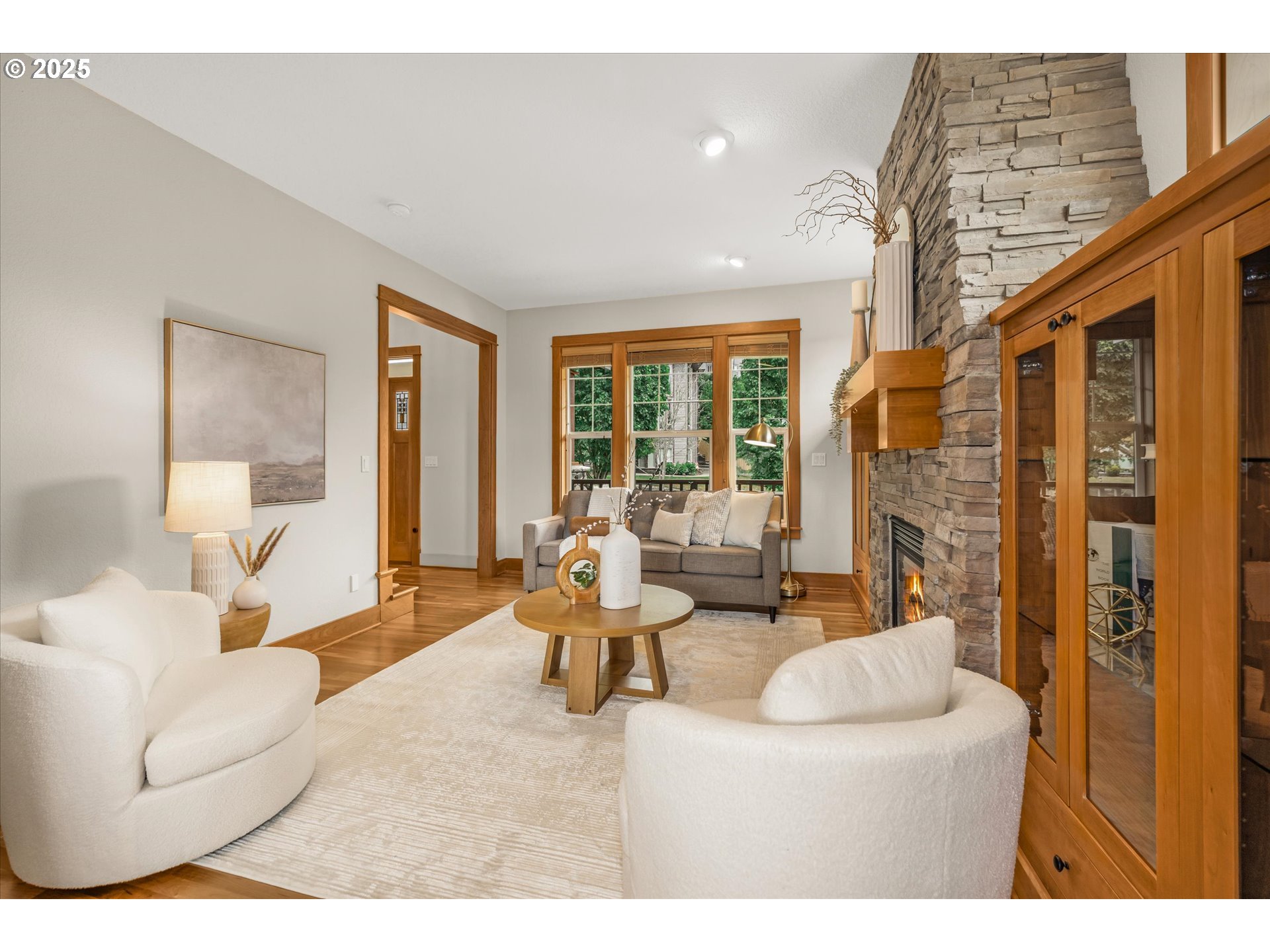 14697 Southeast Poppy Hills Drive Happy Valley, OR 97086 - Photo 5 of 48 a living room with furniture and a large window