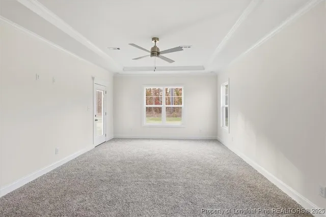 a spacious bathroom with double vanity sink a mirror and a shower