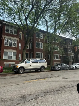 a view of street with parked cars