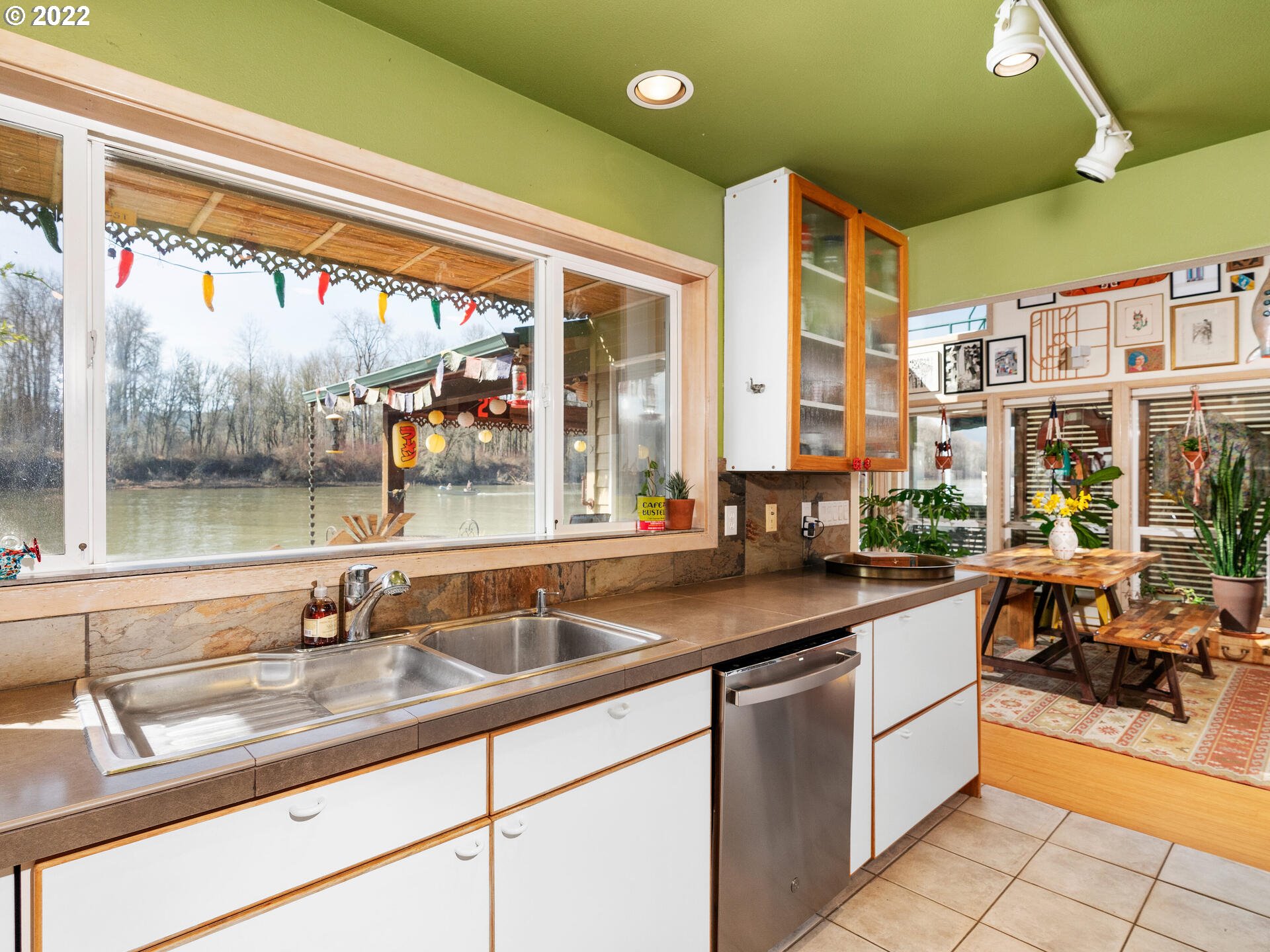 17617 Northwest Sauvie Island Road, Unit 39 Portland, OR 97231 - Photo 12 of 32 a kitchen with sink and view of living room