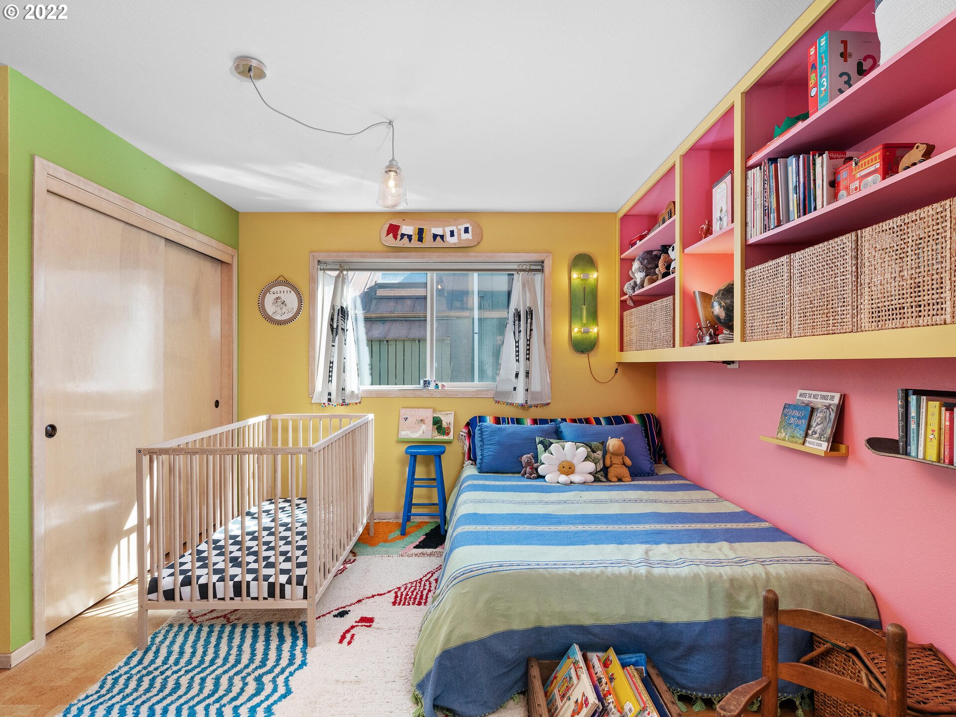 17617 Northwest Sauvie Island Road, Unit 39 Portland, OR 97231 - Photo 13 of 32 a bedroom with a bed and a window