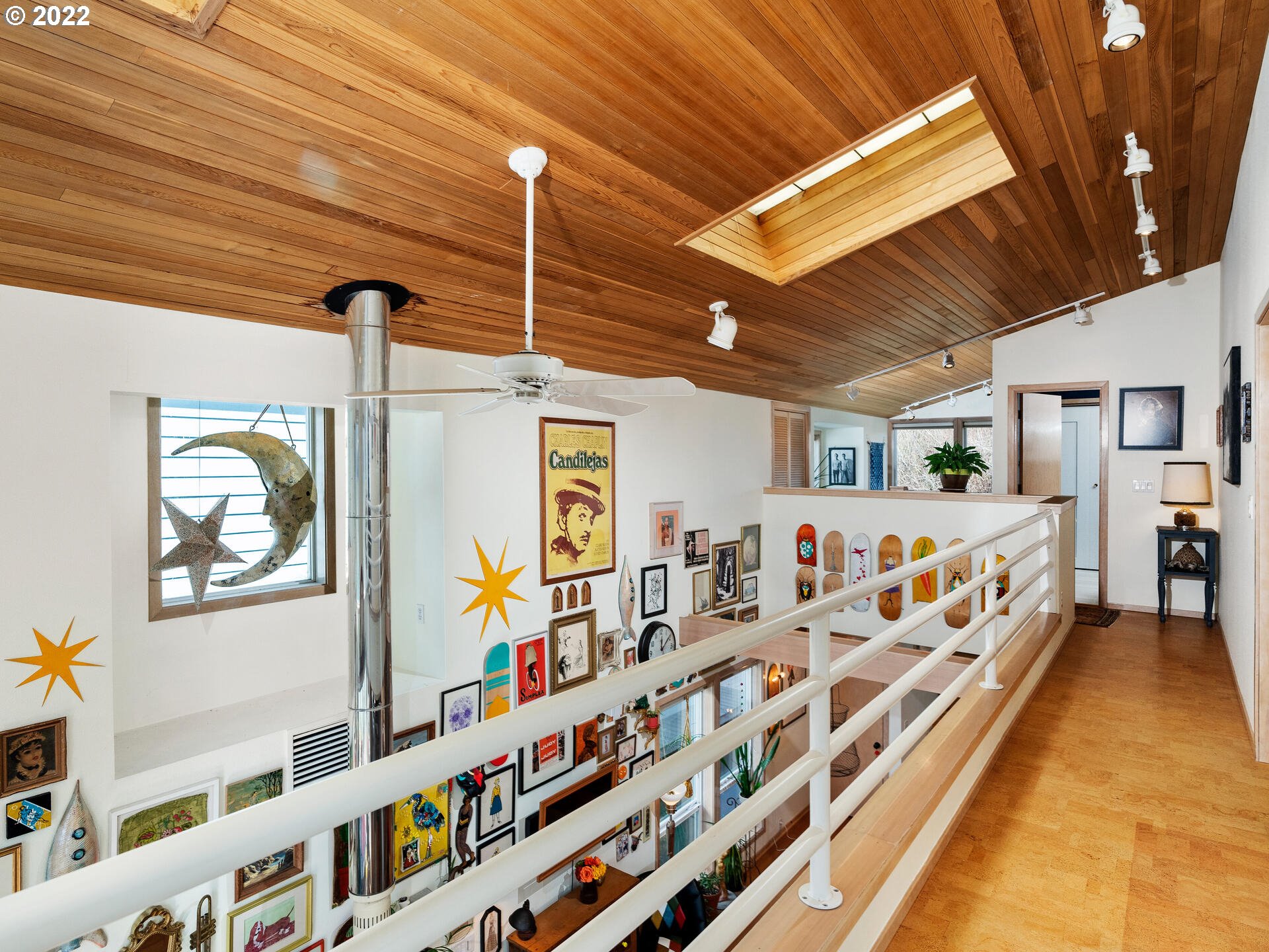 17617 Northwest Sauvie Island Road, Unit 39 Portland, OR 97231 - Photo 16 of 32 a room with lots of white furniture and toys