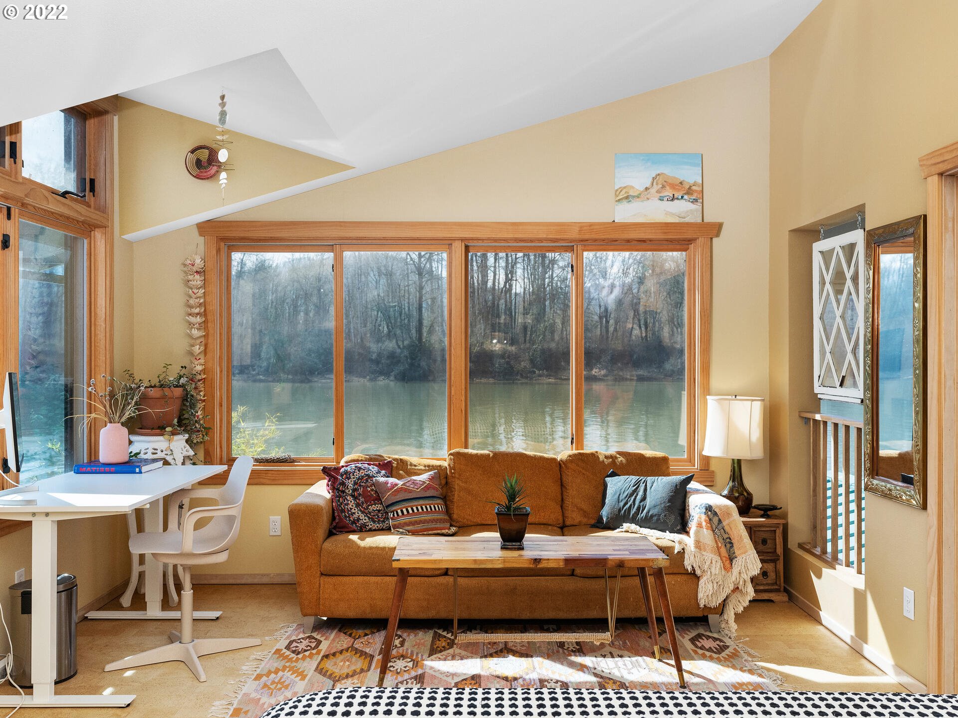 17617 Northwest Sauvie Island Road, Unit 39 Portland, OR 97231 - Photo 18 of 32 a living room with furniture and a large window