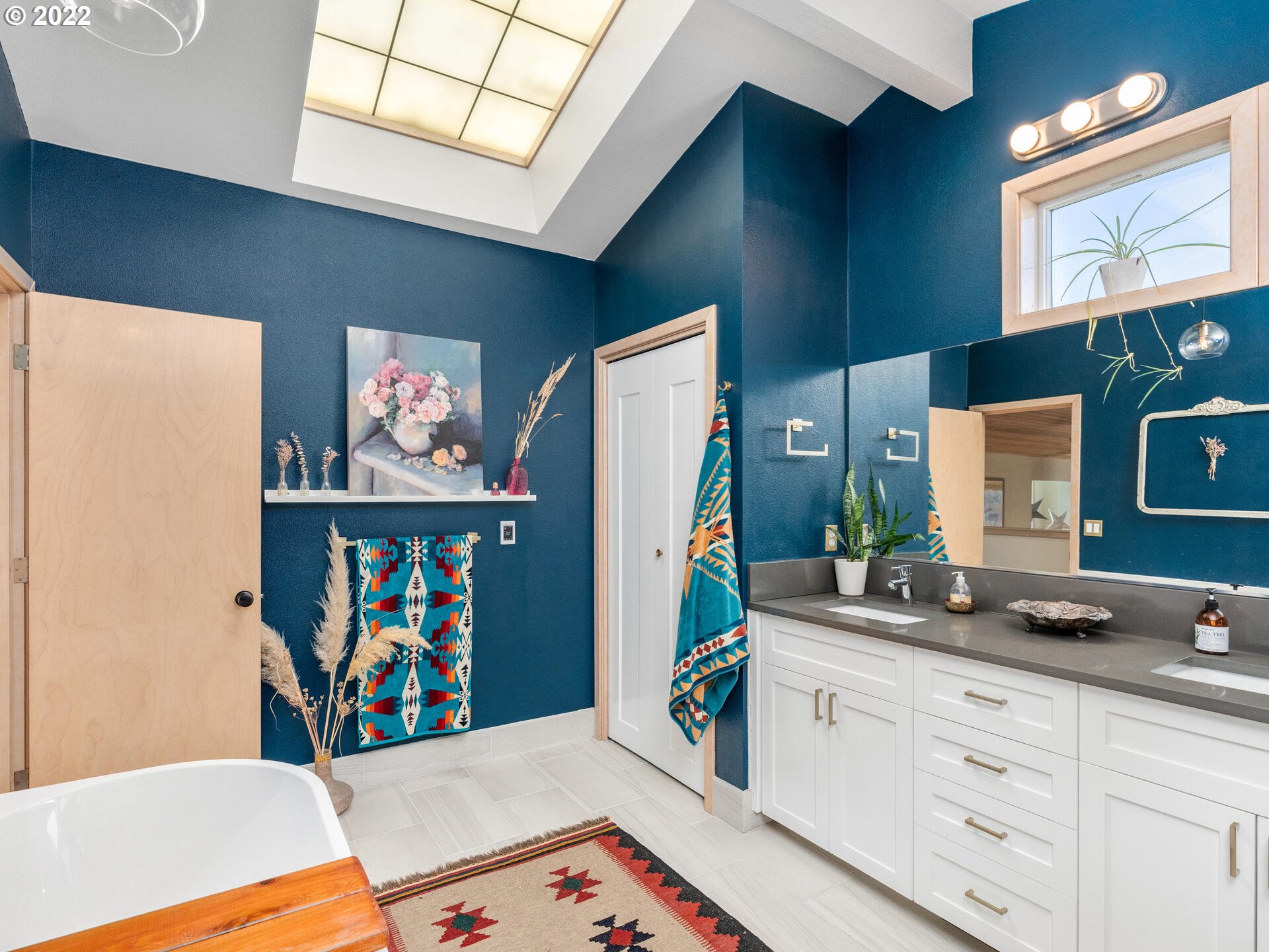 17617 Northwest Sauvie Island Road, Unit 39 Portland, OR 97231 - Photo 21 of 32 a room with furniture and painting on the wall