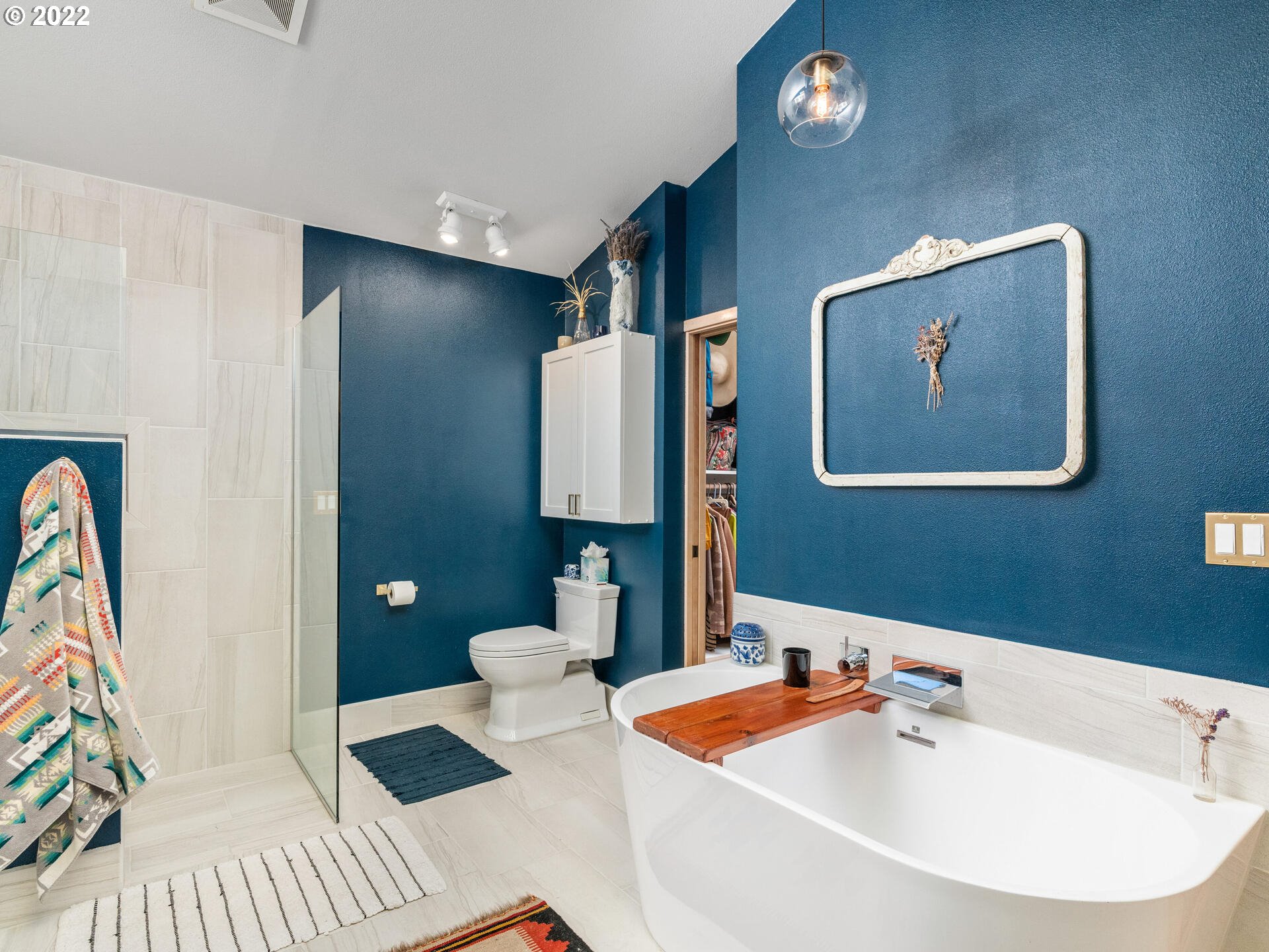 17617 Northwest Sauvie Island Road, Unit 39 Portland, OR 97231 - Photo 23 of 32 a bathroom with a sink and a mirror