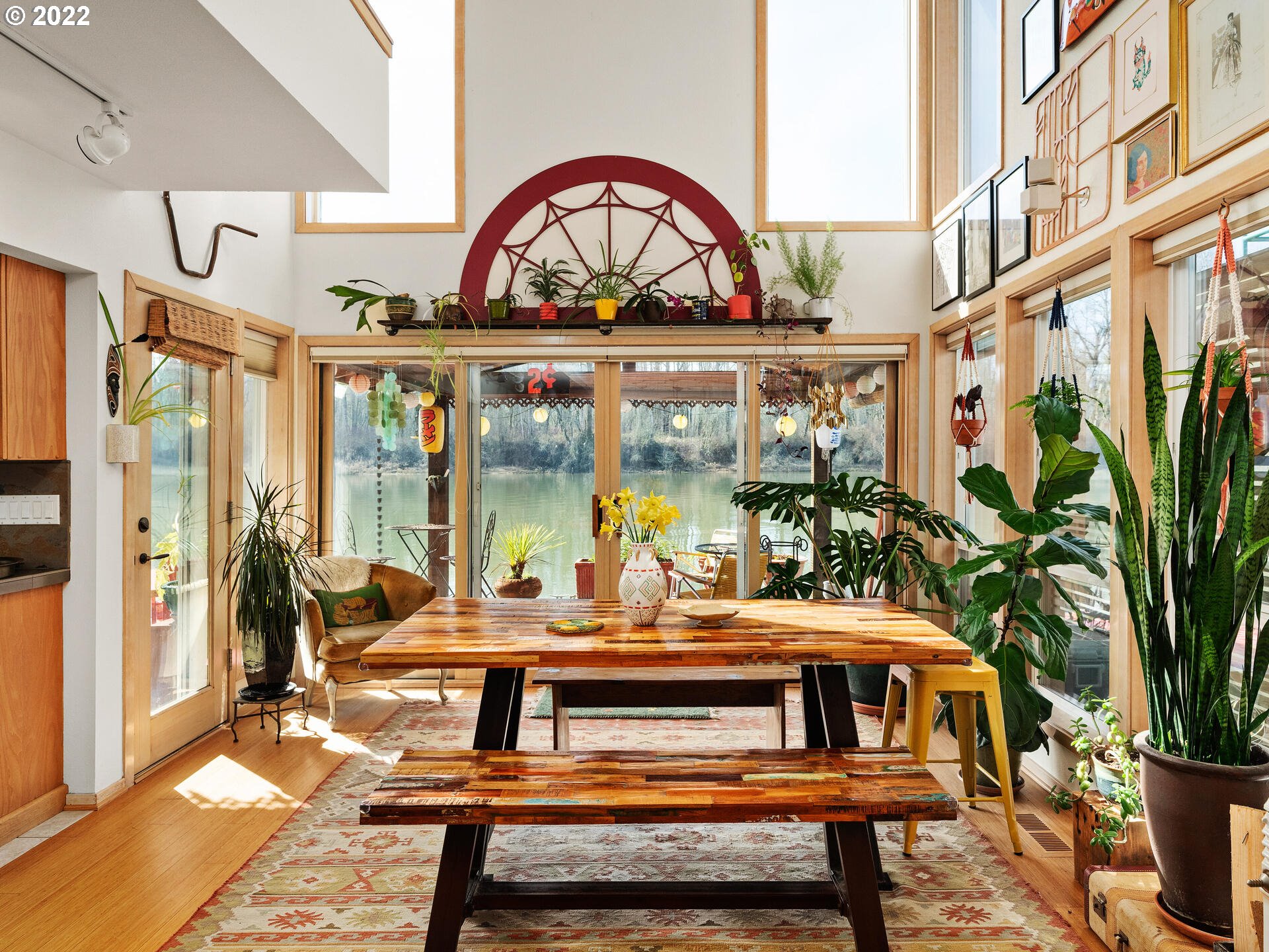 17617 Northwest Sauvie Island Road, Unit 39 Portland, OR 97231 - Photo 8 of 32 a living room with a couch and a potted plant