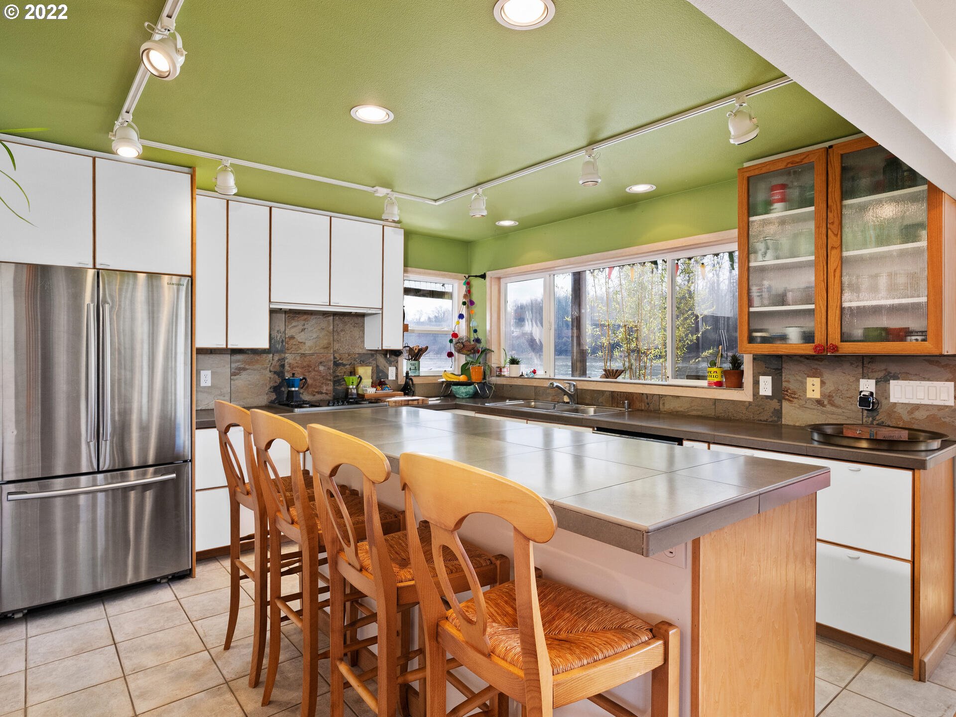 17617 Northwest Sauvie Island Road, Unit 39 Portland, OR 97231 - Photo 9 of 32 a kitchen with granite countertop a sink appliances cabinets and furniture