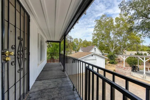 a kitchen with stainless steel appliances granite countertop a sink dishwasher stove and cabinets