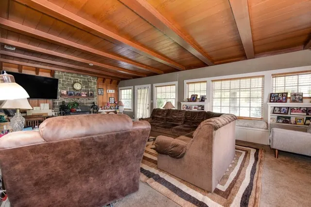 a bed room with a bed and a window