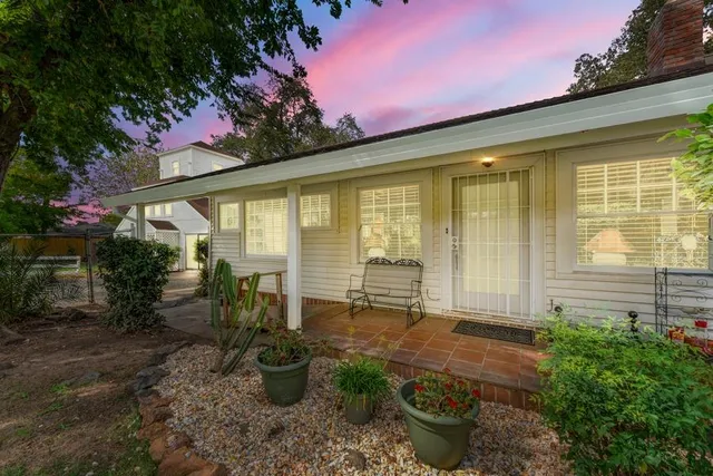 a front view of a house with yard