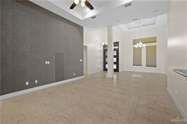 a kitchen with stainless steel appliances granite countertop a stove and cabinets
