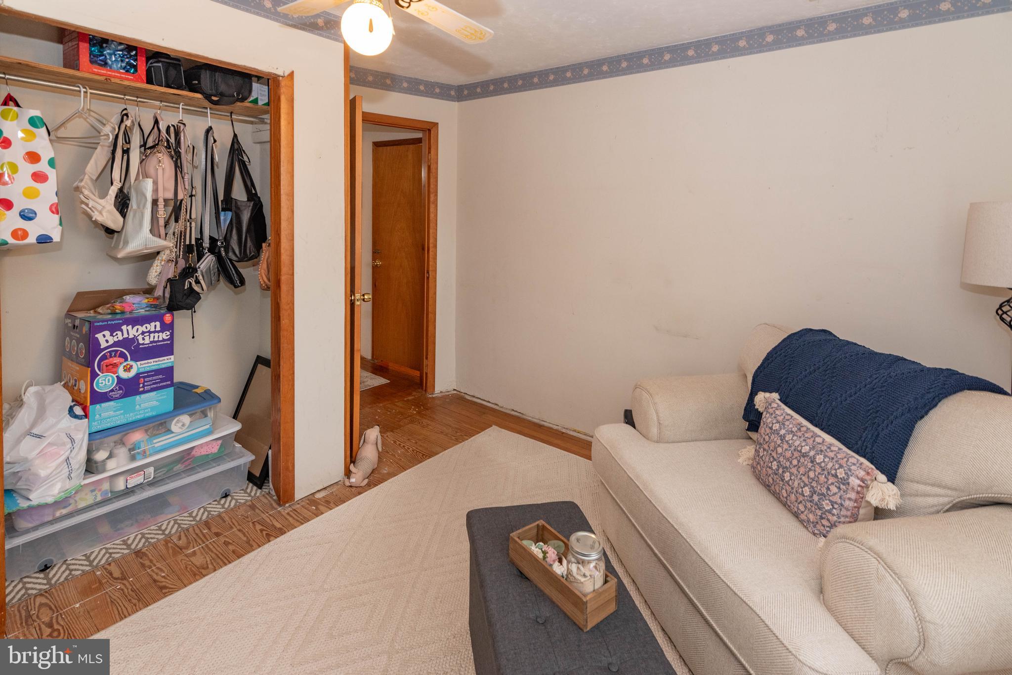 7316 Greenbank Road Baltimore, MD 21220 - Photo 26 of 87 a bedroom with a bed and a cabinets