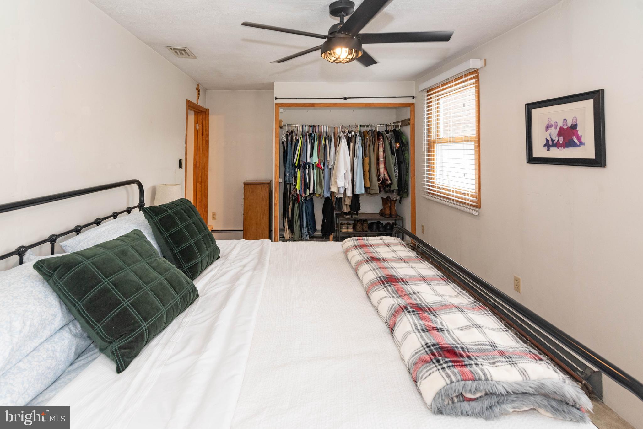 7316 Greenbank Road Baltimore, MD 21220 - Photo 34 of 87 a bedroom with a bed and window