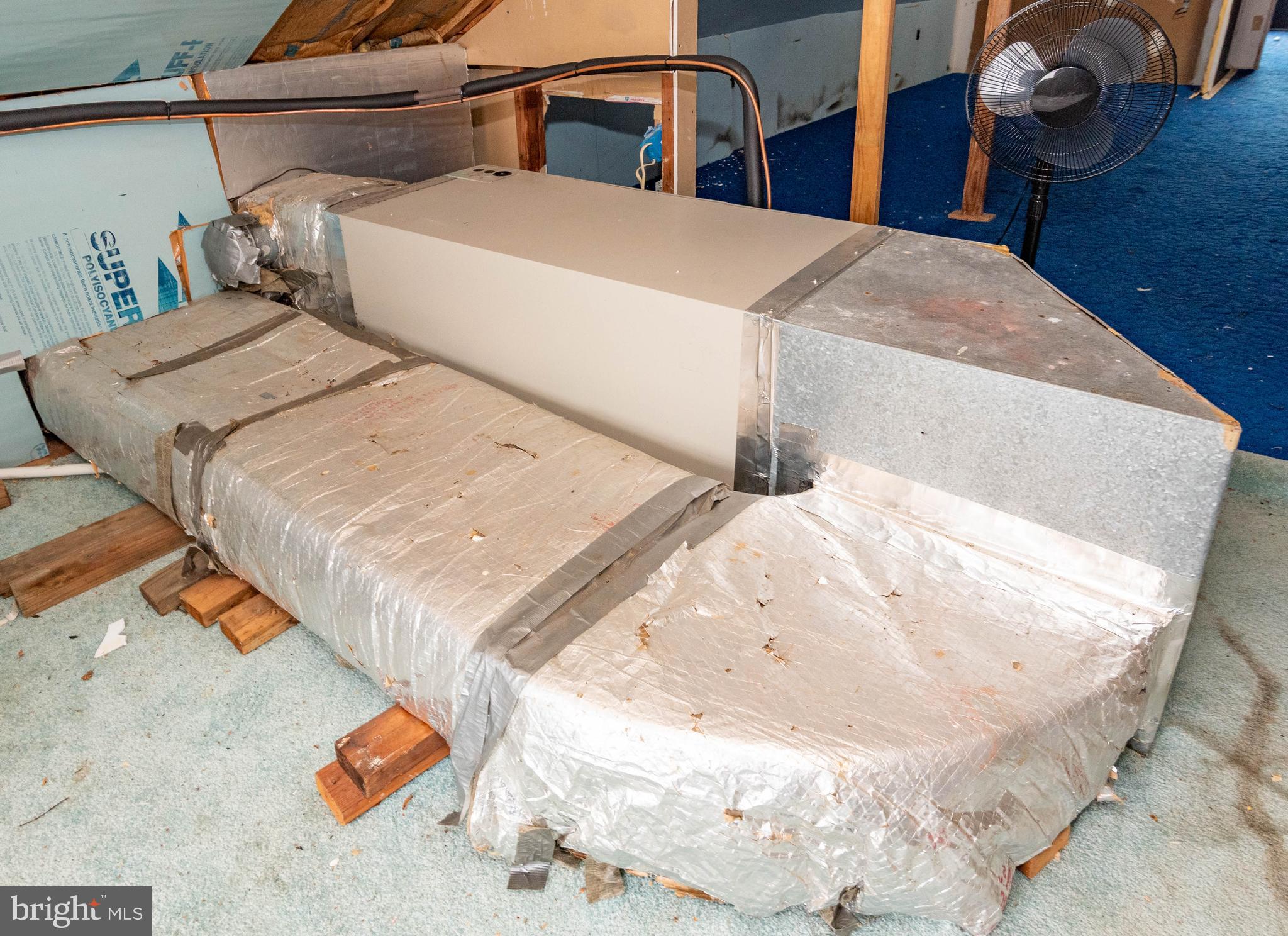 7316 Greenbank Road Baltimore, MD 21220 - Photo 38 of 87 a bed with white sheets and pillows on it