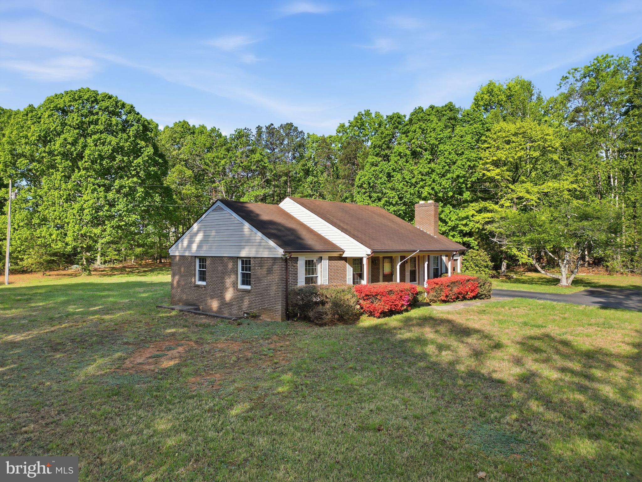 4201 Goldmine Road Goldvein, VA 22720 - Photo 3 of 10 Charming home nestled in lush greenery.