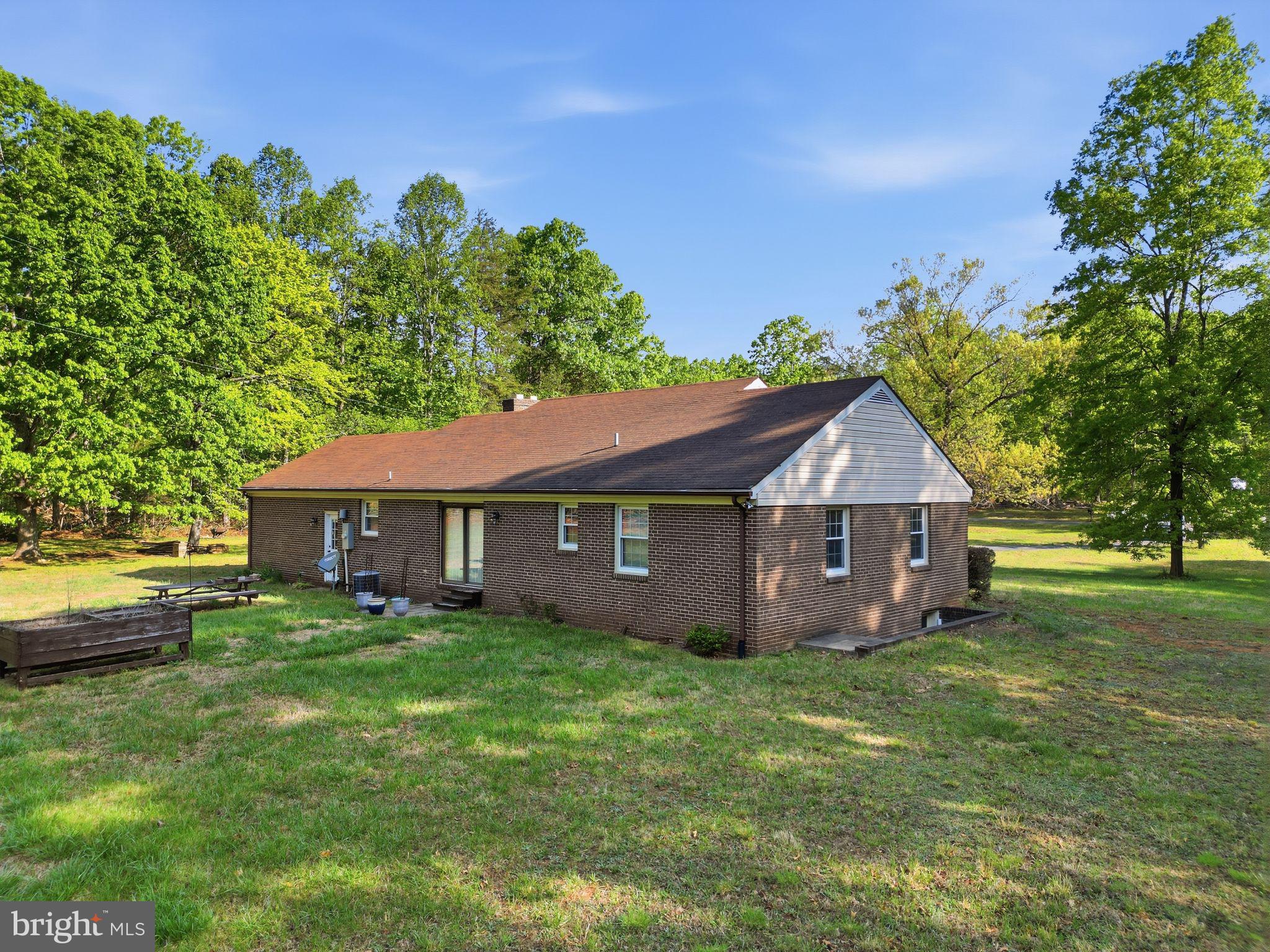 4201 Goldmine Road Goldvein, VA 22720 - Photo 4 of 10 Charming home nestled in nature's embrace.
