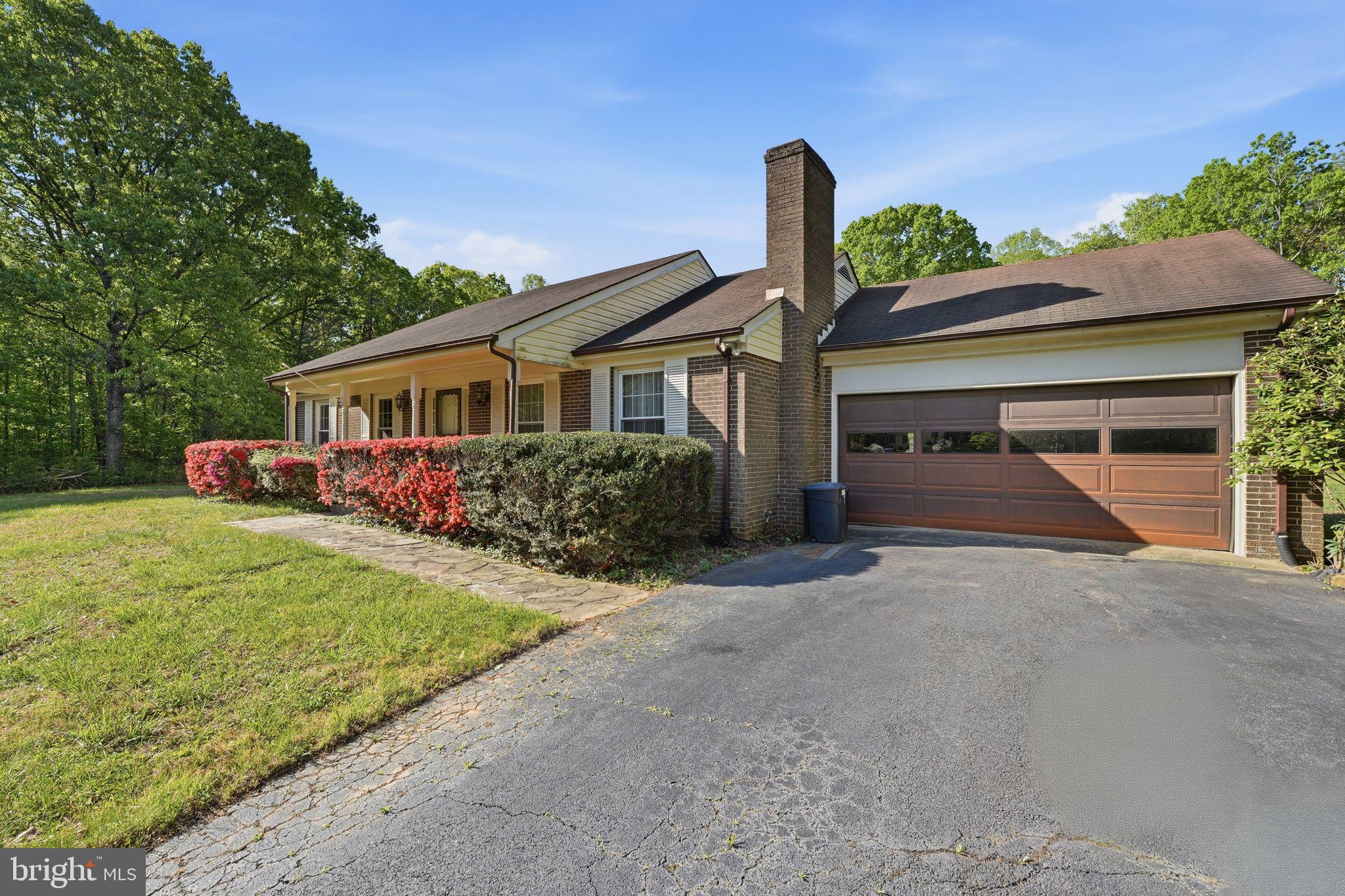 4201 Goldmine Road Goldvein, VA 22720 - Photo 8 of 10 Charming home with lush surroundings.