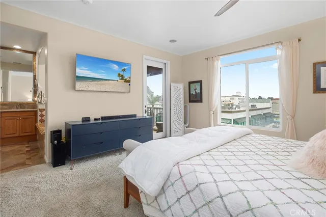 a bed room with a bed and a dresser