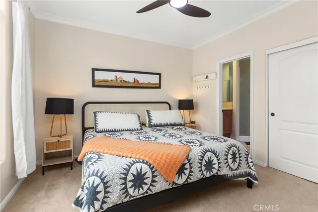 a bedroom with a bed and a dresser in it