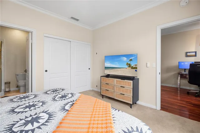 a close view of a stove top oven and cabinets