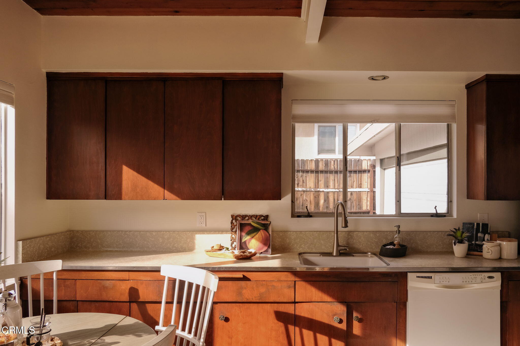 1190 Riviera Drive Pasadena, CA 91107 - Photo 7 of 36 a kitchen with a sink a window and cabinets