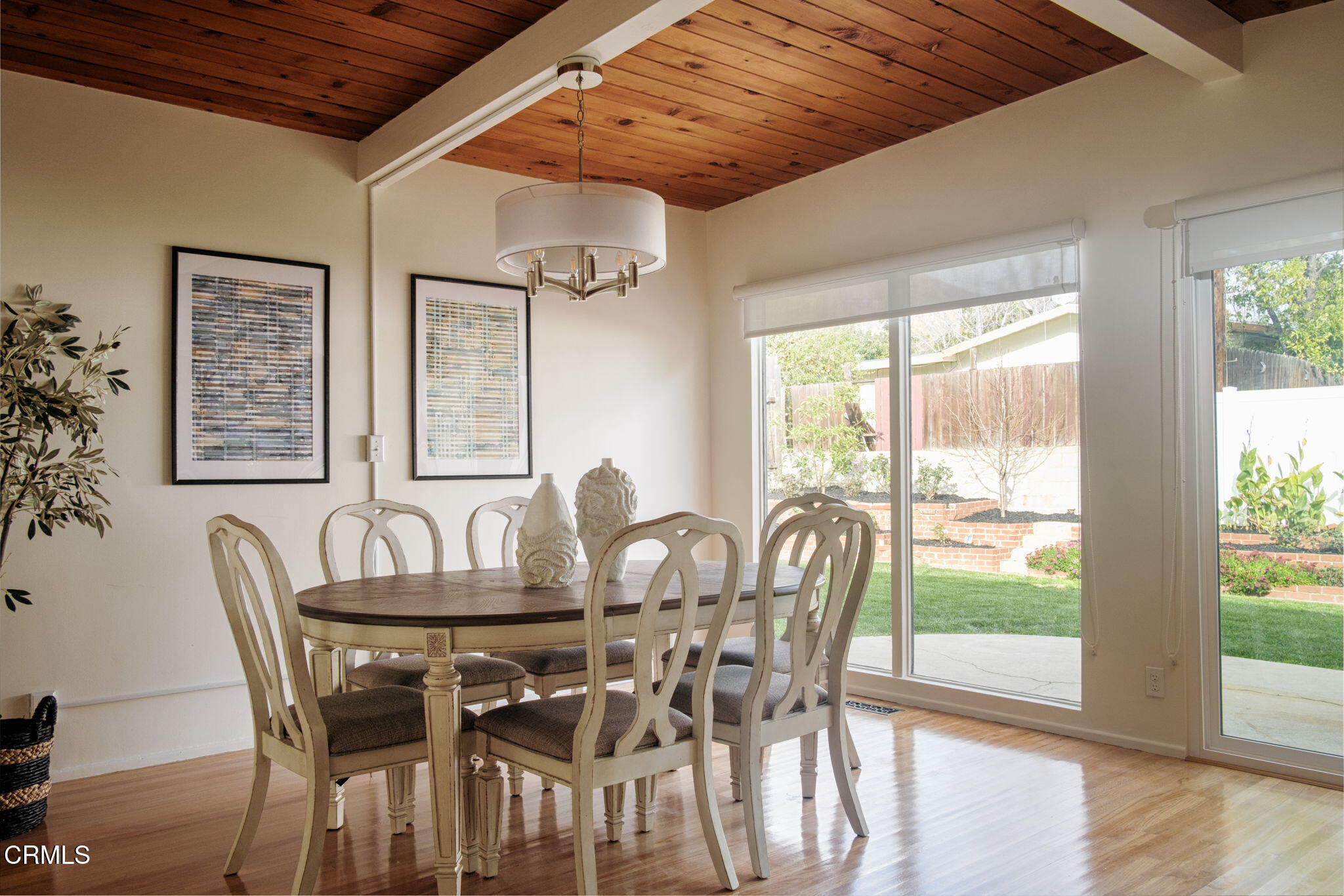 1190 Riviera Drive Pasadena, CA 91107 - Photo 8 of 36 a dining room with furniture a chandelier and wooden floor