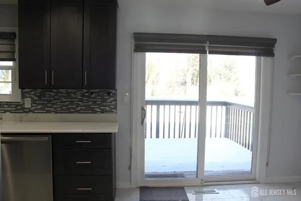 a view of kitchen with windows