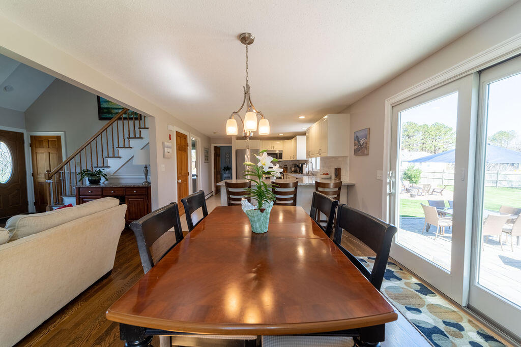 18 Windsor Road Sandwich, MA 02563 - Photo 11 of 35 a view of a dining room with furniture window and wooden floor