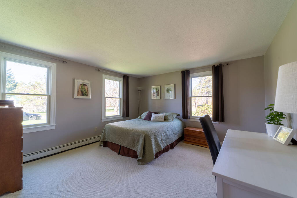 18 Windsor Road Sandwich, MA 02563 - Photo 17 of 35 a bedroom with a bed and window