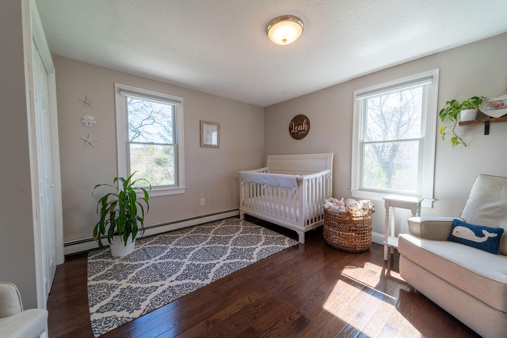 18 Windsor Road Sandwich, MA 02563 - Photo 22 of 35 a living room with furniture and windows