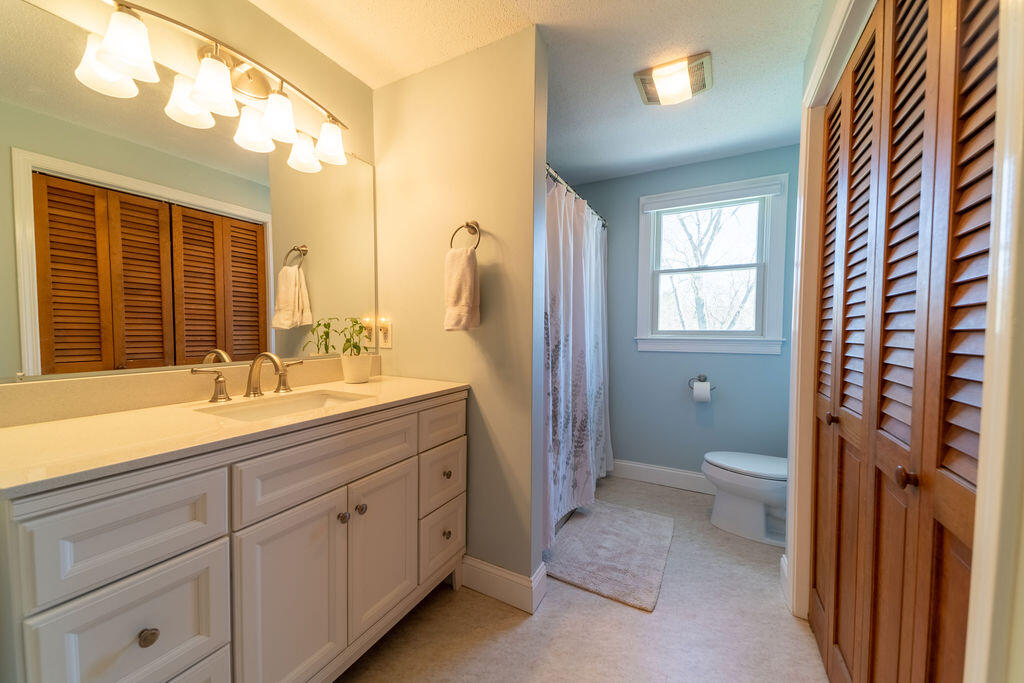 18 Windsor Road Sandwich, MA 02563 - Photo 23 of 35 a bathroom with a granite countertop sink toilet and shower