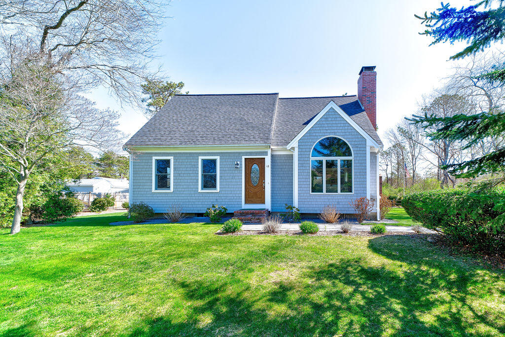 18 Windsor Road Sandwich, MA 02563 - Photo 4 of 35 a front view of a house with garden