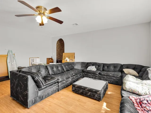 a living room with furniture and a couch