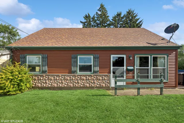 a house with garden in front of it